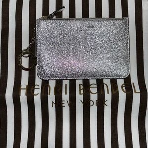 NWOT HENRI BENDEL COIN BAG
Never used, dust bag included